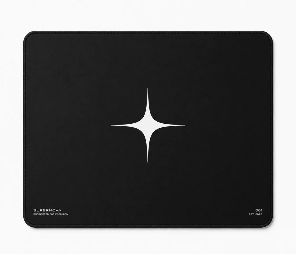 Black gaming mousepad with white star logo, precision engineered for modern setups